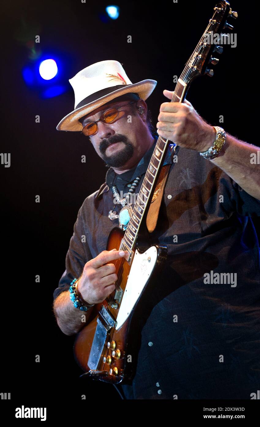 US actor and musician Steven Seagal and his Blues Band perform during the  21st Festival Blues of Cognac in Cognac, France on July 2, 2014. Photo by  Patrick Bernard/ABACAPRESS.COM Stock Photo -