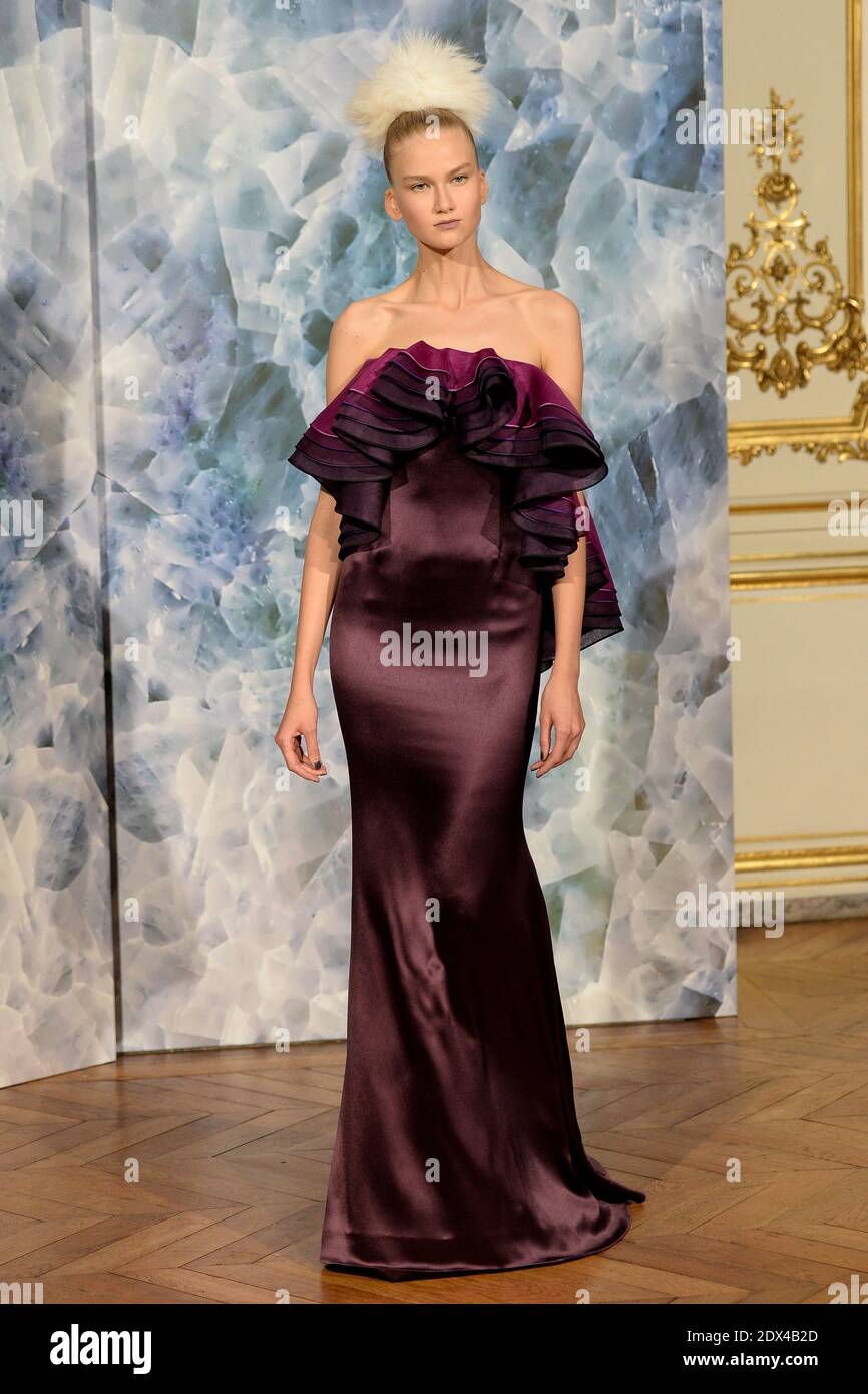 A model displays a creation by designer Alexis Mabille for his Fall-Winter  2014/2015 Haute Couture collection show held at Hotel d'Evreux in Paris,  France, on July 7, 2014. Photo by Nicolas Briquet/ABACAPRESS.COM