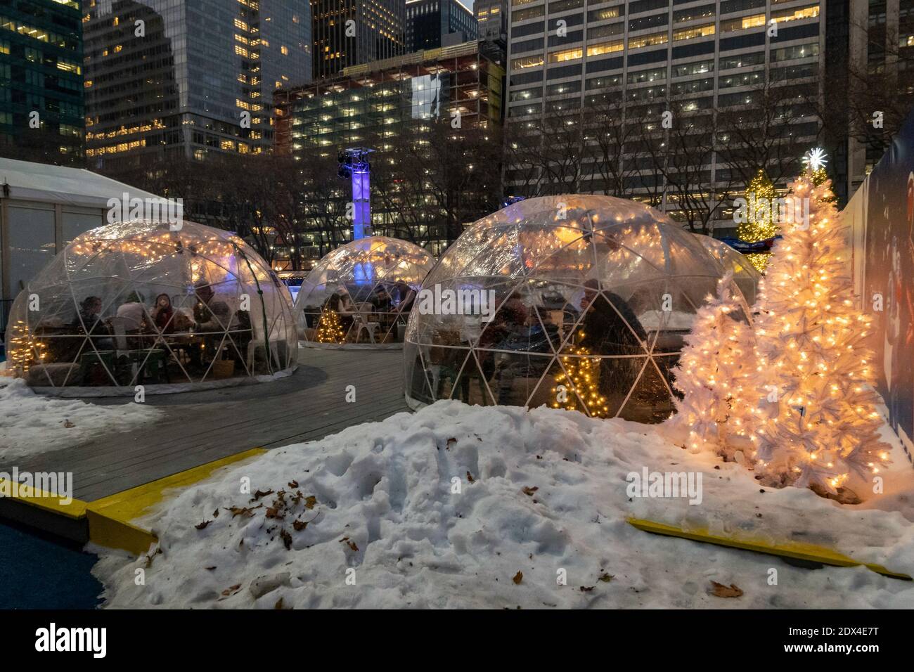Festive warming igloos in Bryant Park Holiday Village provide a warm