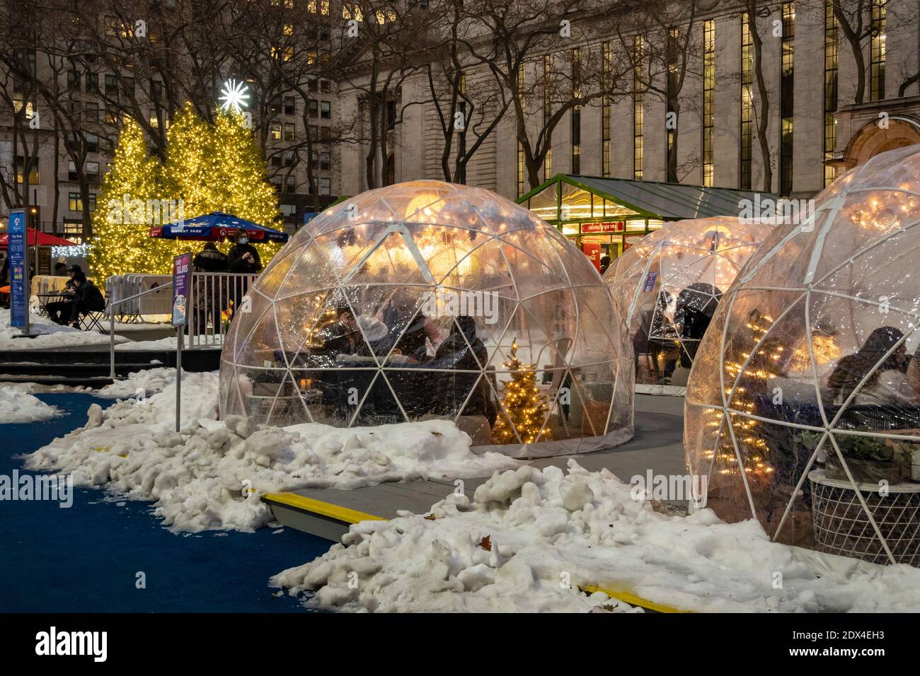 Festive warming igloos in Bryant Park Holiday Village provide a warm