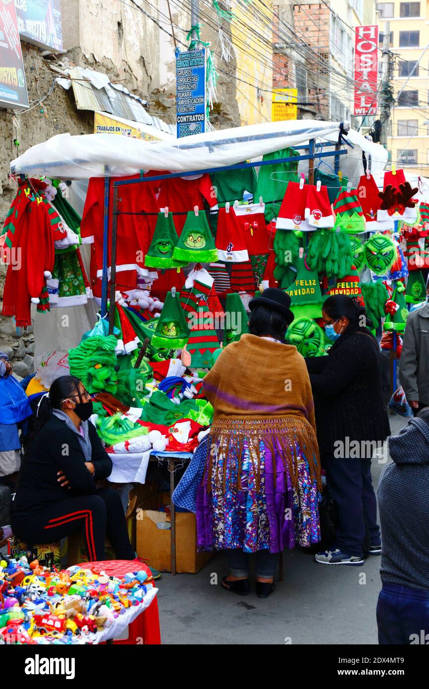 Magical Andes Photography  Stall selling red and yellow underwear on New Year's  Eve, La Paz, Bolivia photograph