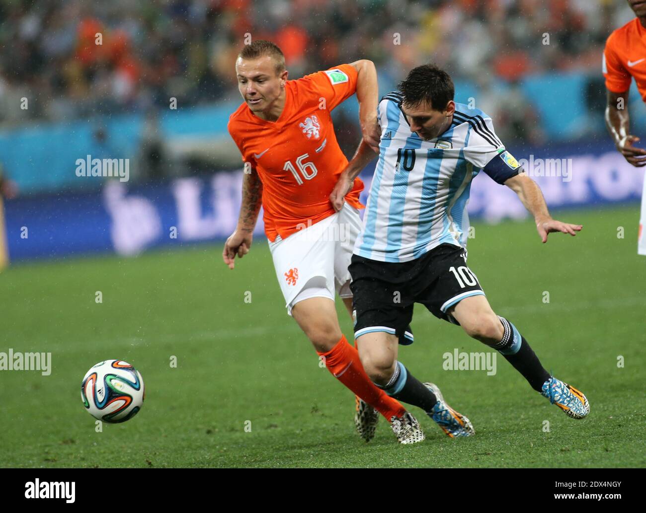 Jordy Clasie of Holland trying to stop Lioenl Messi of Argentina - Soccer - FIFA World Cup 2014 - Semi Final - Netherlands v Argentina - Arena de Sao Paulo, Brazil, Wednesday July 9, 2014. Photo by Giuliano Bevilacqua/ABACAPRESS.COM Stock Photo