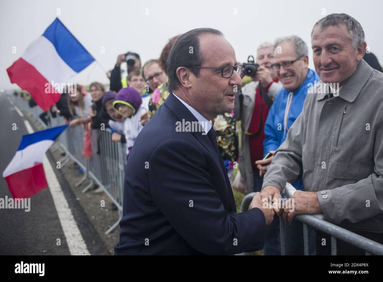 French President Francois Hollande Spend A Visit To The Finish Line Of french-president-francois-hollande-spend-a-visit-to-the-finish-line-of