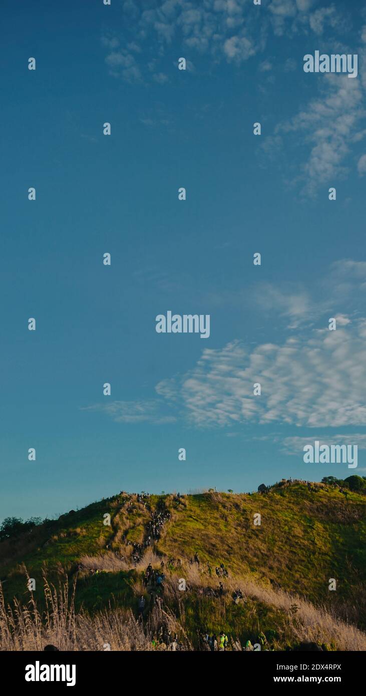 Scenic View Of Landscape Against Blue Sky Stock Photo