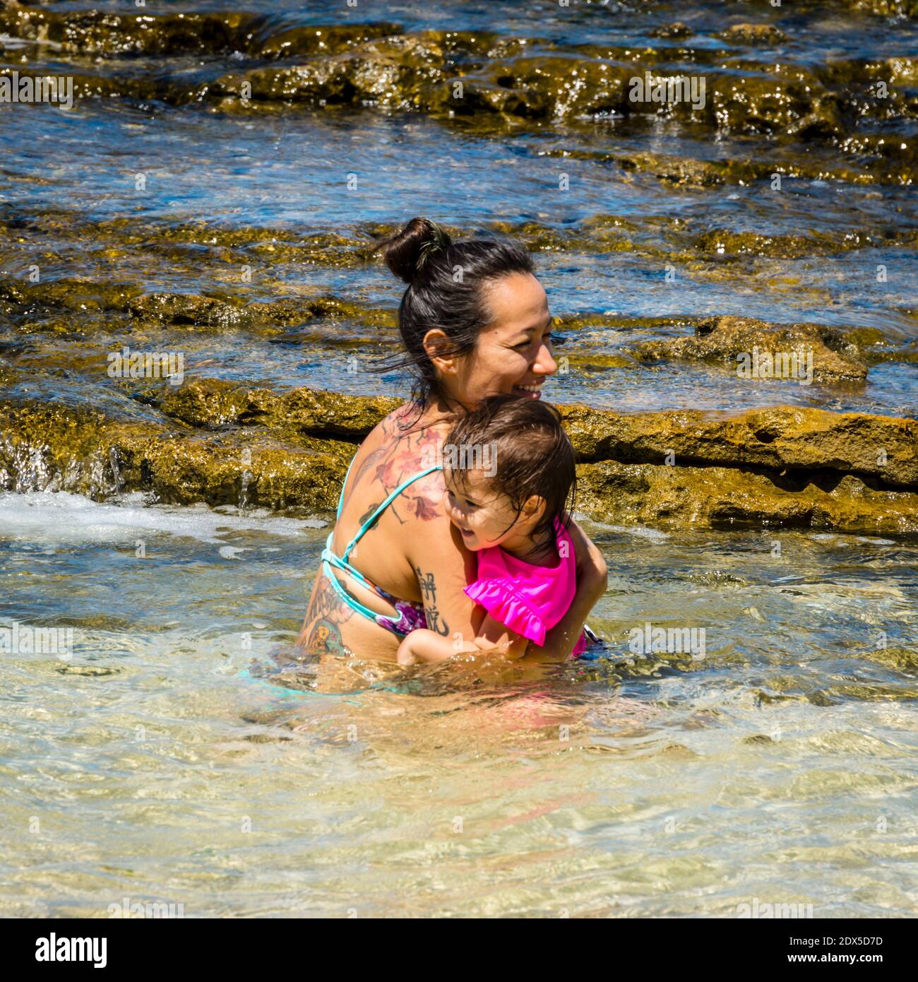 Maui, Hawaii, Ho‘okipa, Mama & Child in Tide Pools Stock Photo