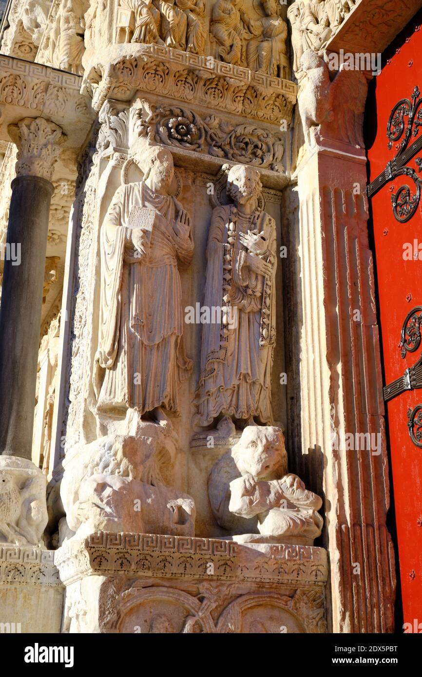 Carvings of religious figured on outside of the Abbatiale Saint-Gilles du Gard in Saint-Gilles, France Stock Photo
