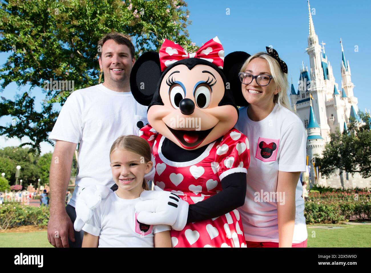 Actress and country music artist Jamie Lynn Spears poses with her husband, Jamie Watson, her six-year-old daughter Maddie and Minnie Mouse in front of Cinderella Castle at the Magic Kingdom park on Aug. 14, 2014 in Lake Buena Vista, Florida. Spears, the sister of pop superstar Britney Spears and former star of 'Zoey 101' on Nickelodeon, lives in Nashville, Tenn and is currently on tour to support her first country music single. Her sister Britney launched her career at Walt Disney World, starring in 'The All-New Mickey Mouse Club' that taped at Disney's Hollywood Studios theme park. Photo by C Stock Photo