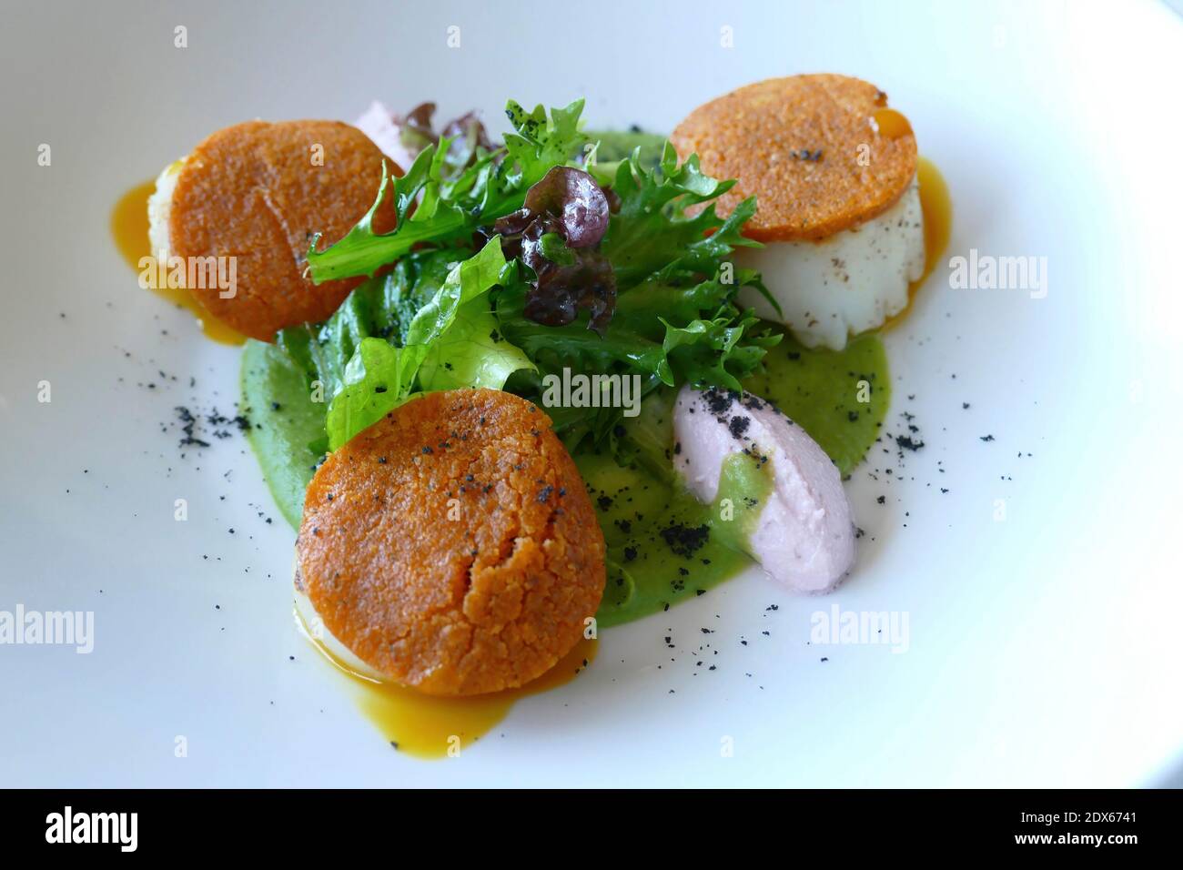 RABAT, MOROCCO - FEB 11, 2019 - Grilled scallop appetizer at a luxury restaurant in The View Hotel, Rabat, Morocco Stock Photo