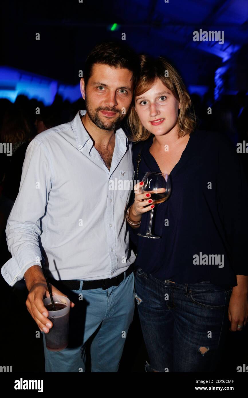 Exclusive Maxime Delauney and his wife Jeanne attending the 7th