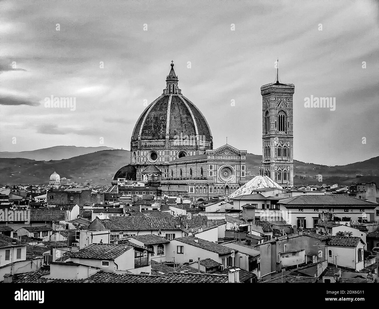 The Duomo In Florence Italy Viewed Over Rooftops In Black And White