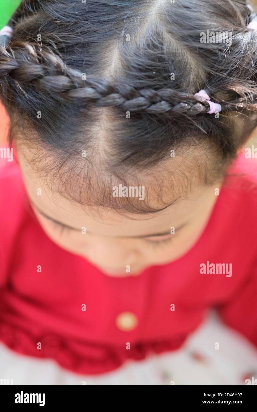 Close-up High Angle View Of Girl With Braided Hairstyle At Home Stock Photo - Alamy Close-up High Angle View Of Girl With Braided Hairstyle At Home Stock Photo - Alamy