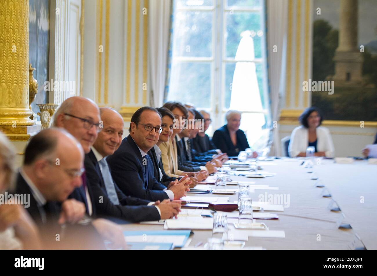 President Francois Hollande heads the weekly cabinet meeting at the Elysee presidential palace in Paris, France, August 27, 2014. Hollande installed a former Banker Emmanuel Macron, a 36-year-old ex-Rothschild banker and architect of the president's economic policy. Photo Thierry Orban/ABACAPRESS.COM Stock Photo
