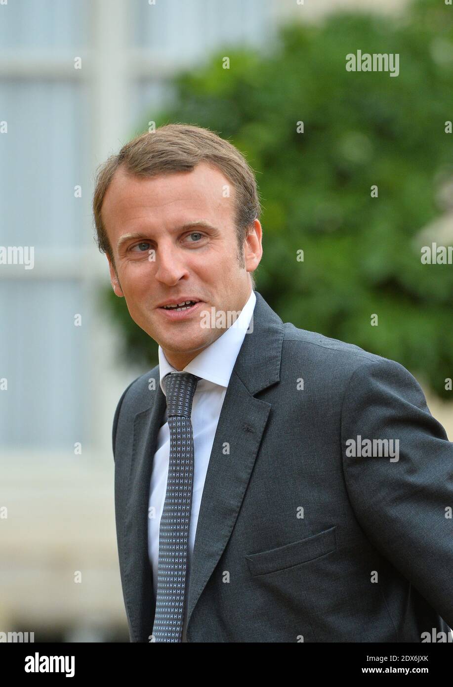 Newly-appointed Economy Minister Emmanuel Macron arriving at the Elysee presidential palace in Paris, France before a weekly cabinet meeting. French President Francois Hollande on August 27 installed a former banker and ally as economy minister in an emergency reshuffle seen as the "last chance" to haul France out of the biggest crisis of his presidency. Hollande caught everyone off guard with the appointment of Emmanuel Macron, a 36-year-old ex-Rothschild banker and architect of the president's economic policy. Photo by Christian Liewig/ABACAPRESS.COM Stock Photo