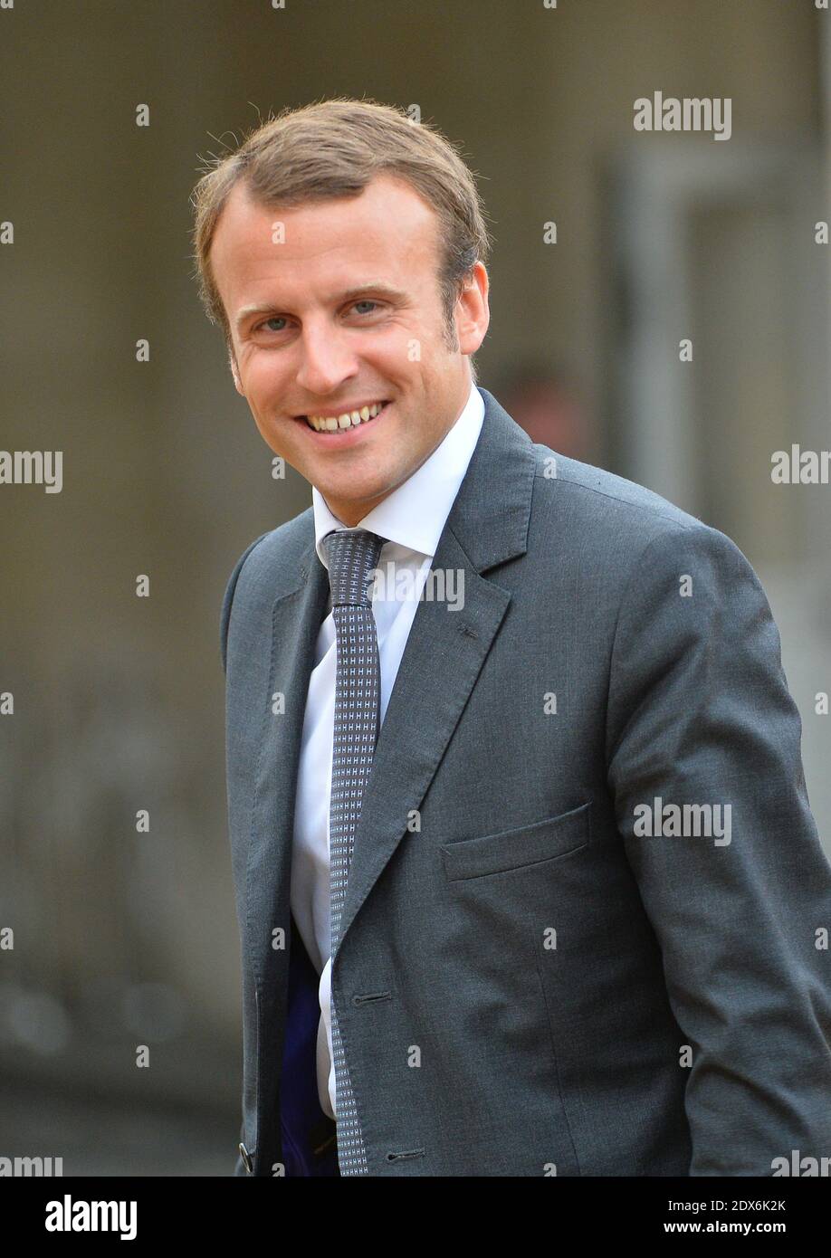 Newly-appointed Economy Minister Emmanuel Macron arriving at the Elysee presidential palace in Paris, France before a weekly cabinet meeting. French President Francois Hollande on August 27 installed a former banker and ally as economy minister in an emergency reshuffle seen as the 'last chance' to haul France out of the biggest crisis of his presidency. Hollande caught everyone off guard with the appointment of Emmanuel Macron, a 36-year-old ex-Rothschild banker and architect of the president's economic policy. Photo by Christian Liewig/ABACAPRESS.COM Stock Photo