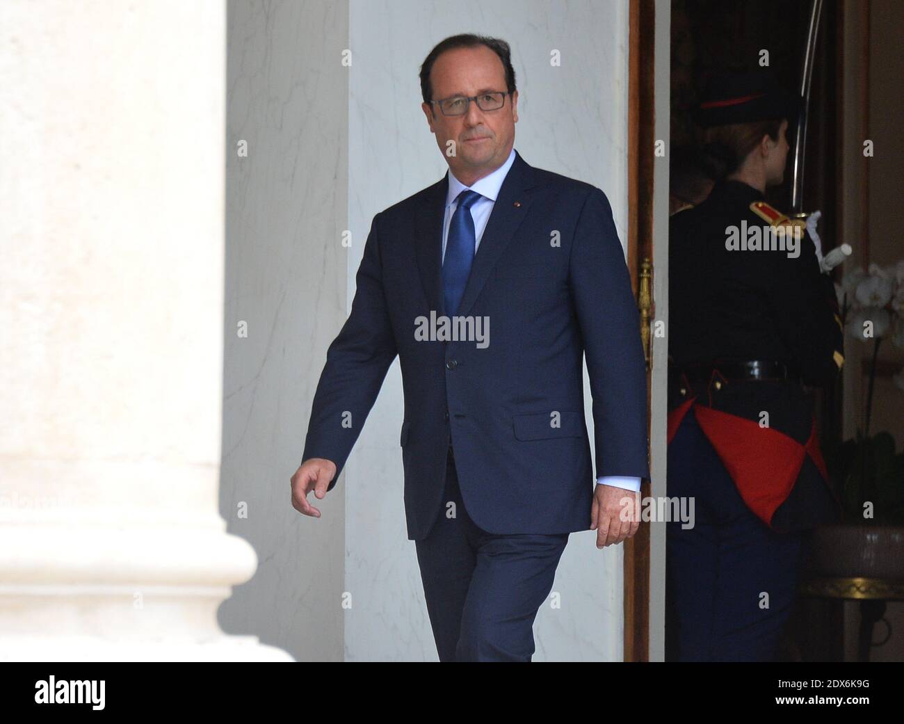 President Francois Hollande leaving the Elysee presidential palace in Paris, France after a weekly cabinet meeting. French President Francois Hollande on August 27 installed a former banker and ally as economy minister in an emergency reshuffle seen as the 'last chance' to haul France out of the biggest crisis of his presidency. Hollande caught everyone off guard with the appointment of Emmanuel Macron, a 36-year-old ex-Rothschild banker and architect of the president's economic policy. Photo by Christian Liewig/ABACAPRESS.COM Stock Photo