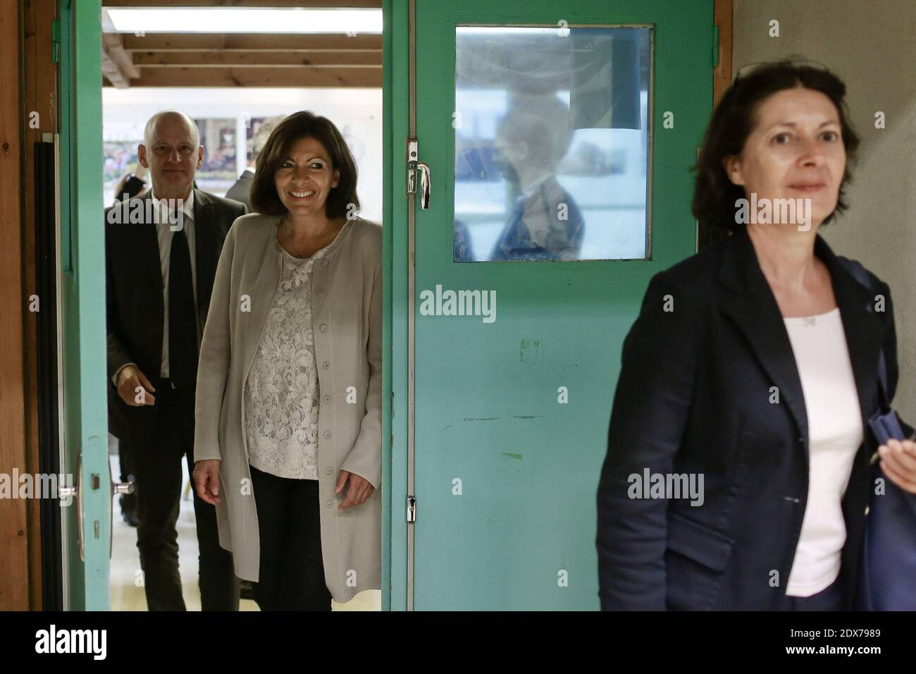 Paris Mayor Anne Hidalgo flanked by Paris 4th district Mayor Christophe Girard takes part to the start of the new school year (rentree scolaire) in the 4th district of Paris, France, on September 02, 2014. Photo by Stephane Lemouton/ABACAPRESS.COM Stock Photo
