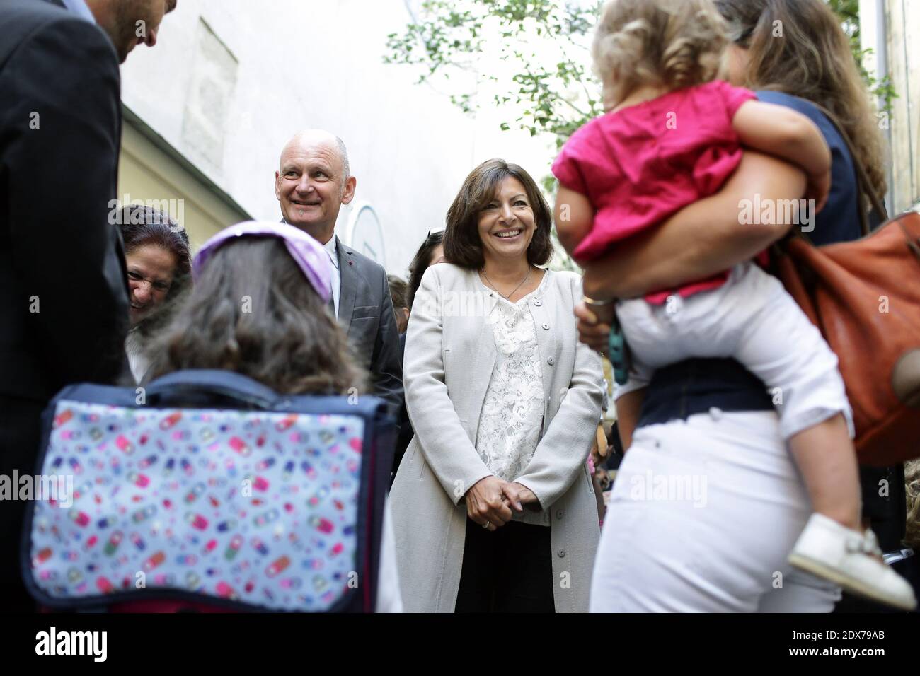 Paris Mayor Anne Hidalgo flanked by Paris 4th district Mayor Christophe Girard takes part to the start of the new school year (rentree scolaire) in the 4th district of Paris, France, on September 02, 2014. Photo by Stephane Lemouton/ABACAPRESS.COM Stock Photo