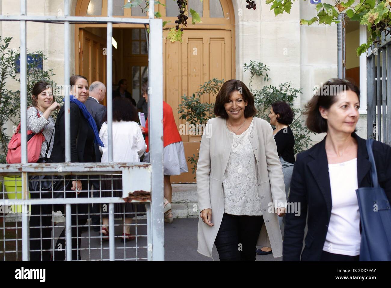 Paris Mayor Anne Hidalgo leaves the start of the new school year (rentree scolaire) in the 4th district of Paris, France, on September 02, 2014. Photo by Stephane Lemouton/ABACAPRESS.COM Stock Photo
