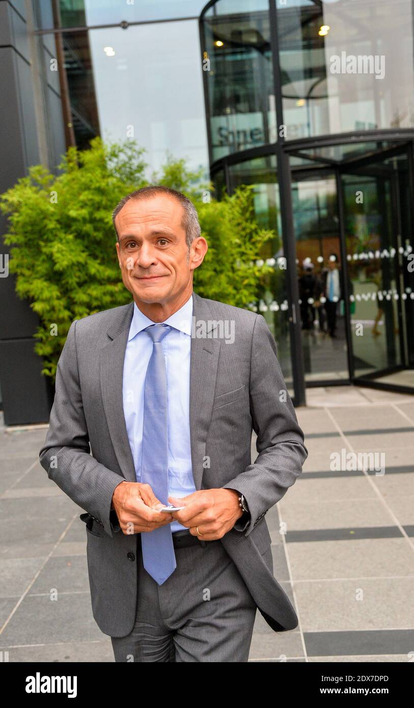 Chairman and CEO of Schneider Electric Jean-Pascal Tricoire during a visit  of French minister for Ecology, Sustainable Development and Energy,  Segolene Royal, focusing on the energy transition on September 4, 2014 at