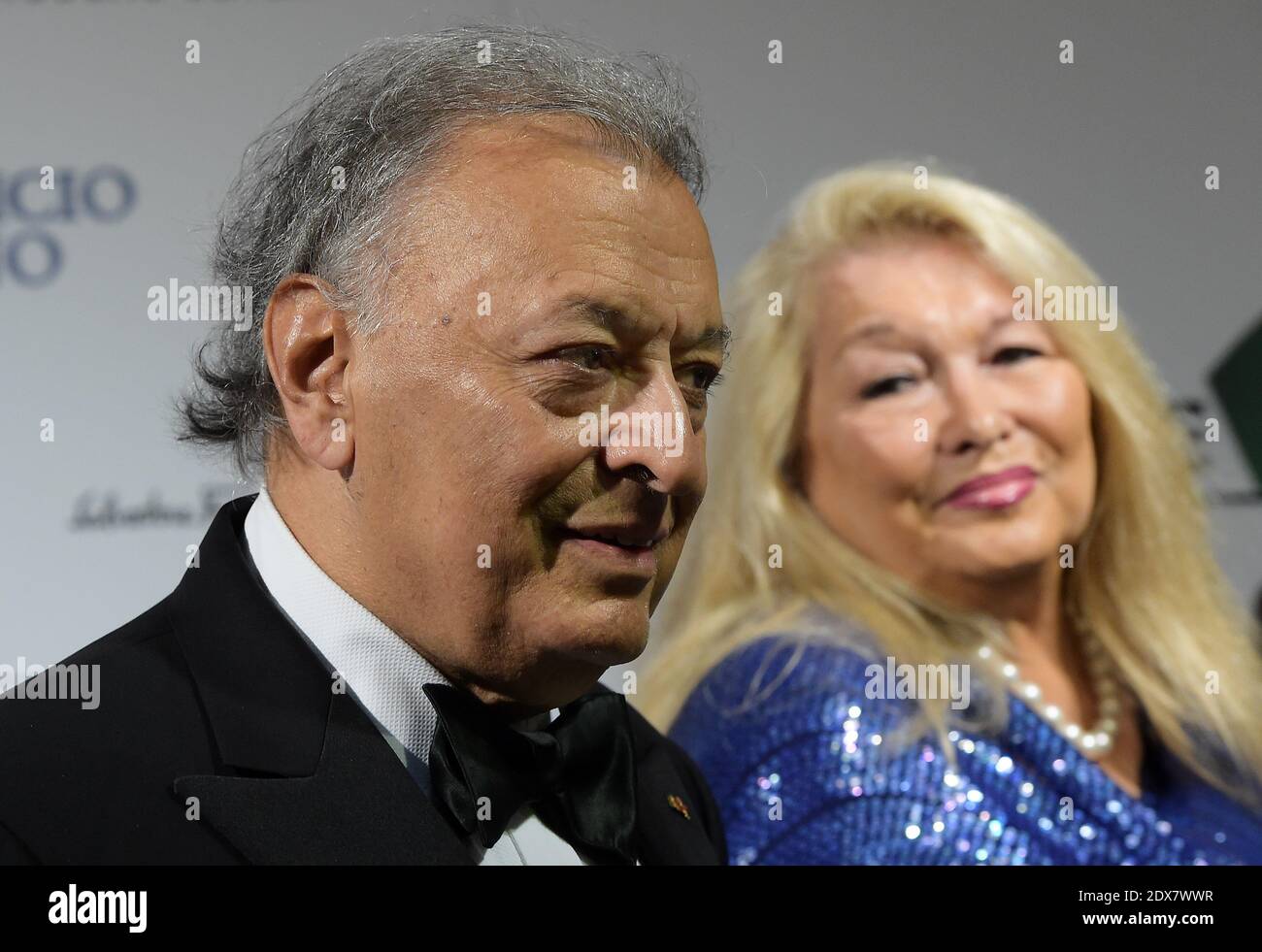 Zubin Mehta and his wife arrive for the Celebrity Fight Night at the Palazzo Vecchio in Florence, Italy, September 7, 2014. The charity event benefits the Andrea Bocelli Foundation and the Muhammad Ali Parkinson Center. Photo by Eric Vandeville/ABACAPRESS.COM Stock Photo