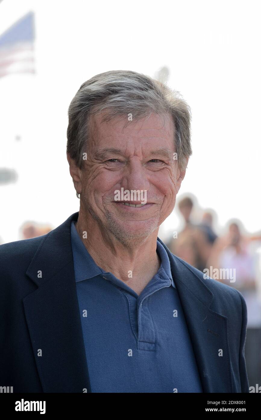 John McTiernan poses for pictures at the 40th American Film Festival in