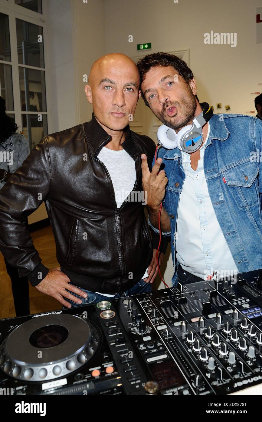 File Photo - Hubert Blanc-Francard and Philippe Cerboneschi Zdar (Cassius) attending the Levi's Party in Paris, France, on September 10, 2014. Philippe Cerboneschi (also known as 'Zdar'), one half of of French dance duo Cassius, accidentally died in Paris on Wednesday, his agent has said. 'He made an accidental fall, through the window of a high floor of a Parisian building,' said Sebastien Farran, without giving further details. Cerboneschi formed Cassius with Hubert Blanc-Francard (aka Boombass) in 1996. They produced for bands such as Phoenix, Beastie Boys, Franz Ferdinand and French hip ho Stock Photo