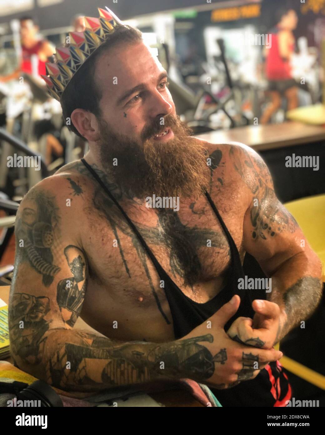 Tattooed Man Looking Away In Gym Stock Photo - Alamy Tattooed Man Looking Away In Gym Stock Photo - Alamy