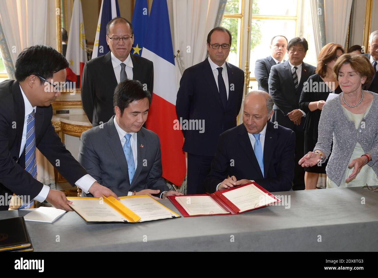 Joseph Emilio Abaya, Benigno Aquino III, Francois Hollande and Laurent Fabius.French President Francois Hollande and his Philippine counterpart Benigno Aquino III, during a signatures ceremony at the Elysee presidential palace, Paris, France. September 17, 2014. Photo by Witt/ Pool/ ABACAPRESS.COM Stock Photo