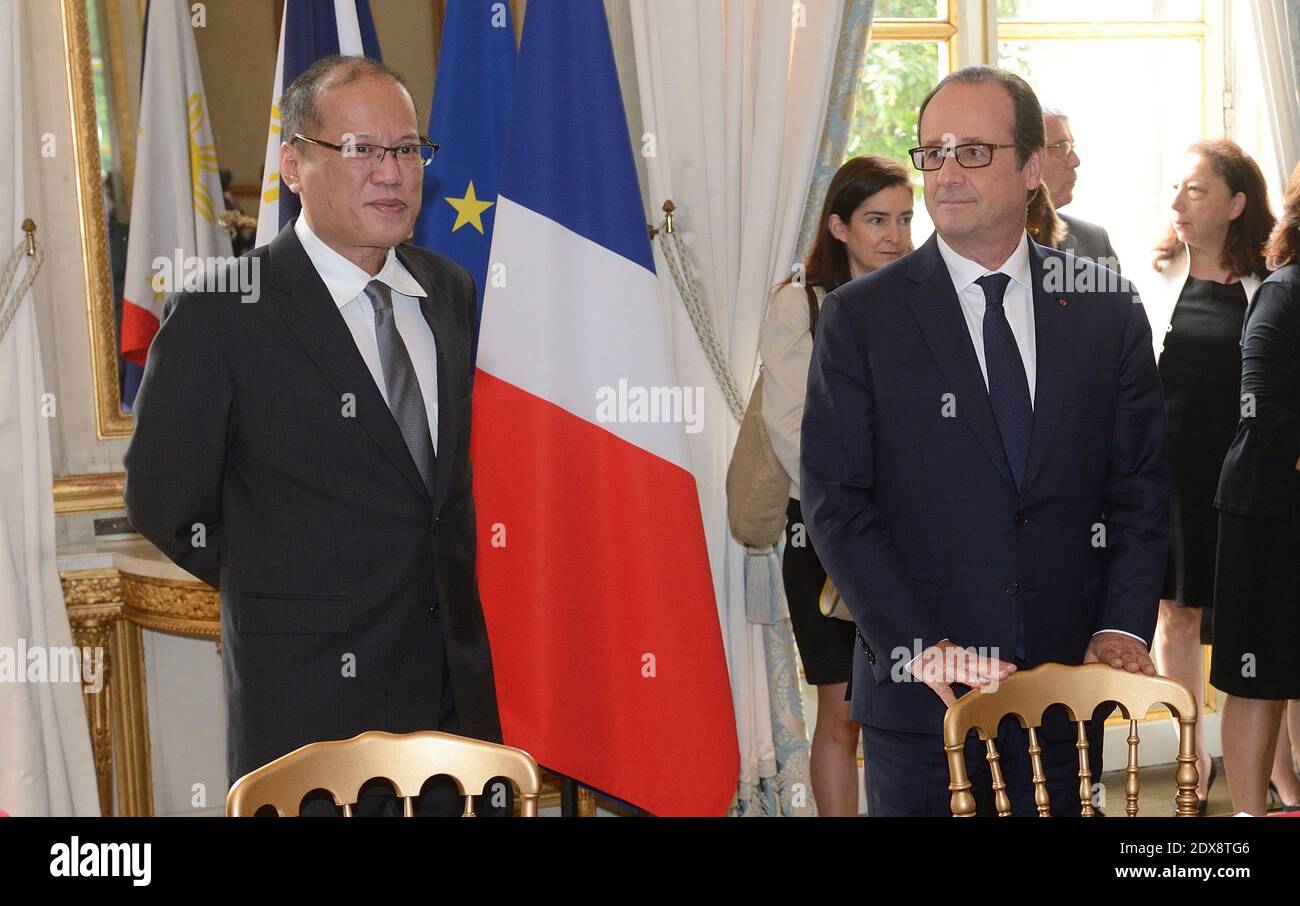 Benigno Aquino III and French President Francois Hollande and his Philippine counterpart Benigno Aquino III, during a signatures ceremony at the Elysee presidential palace, Paris, France. September 17, 2014. Photo by Witt/ Pool/ ABACAPRESS.COM Stock Photo