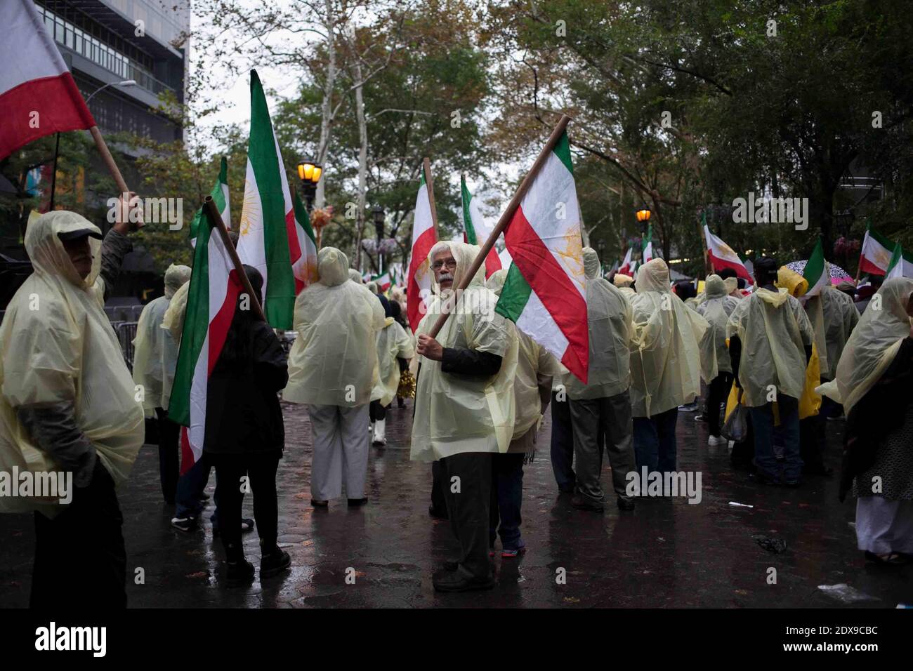 Iranian Americans and other supporters rally against the President of Iran, Hassan Rouhan,i outside the United Nations complex in New York City, NY, USA, on September 25, 2014. Rouhani addressed the UN General Assembly today as demonstrators outside protested what organizers call the Rouhani regime's poor human rights record, sponsorship of terrorism, and deceptive nuclear negotiation tactics. Photo by Ariana Drehsler/ABACAPRESS.COM Stock Photo