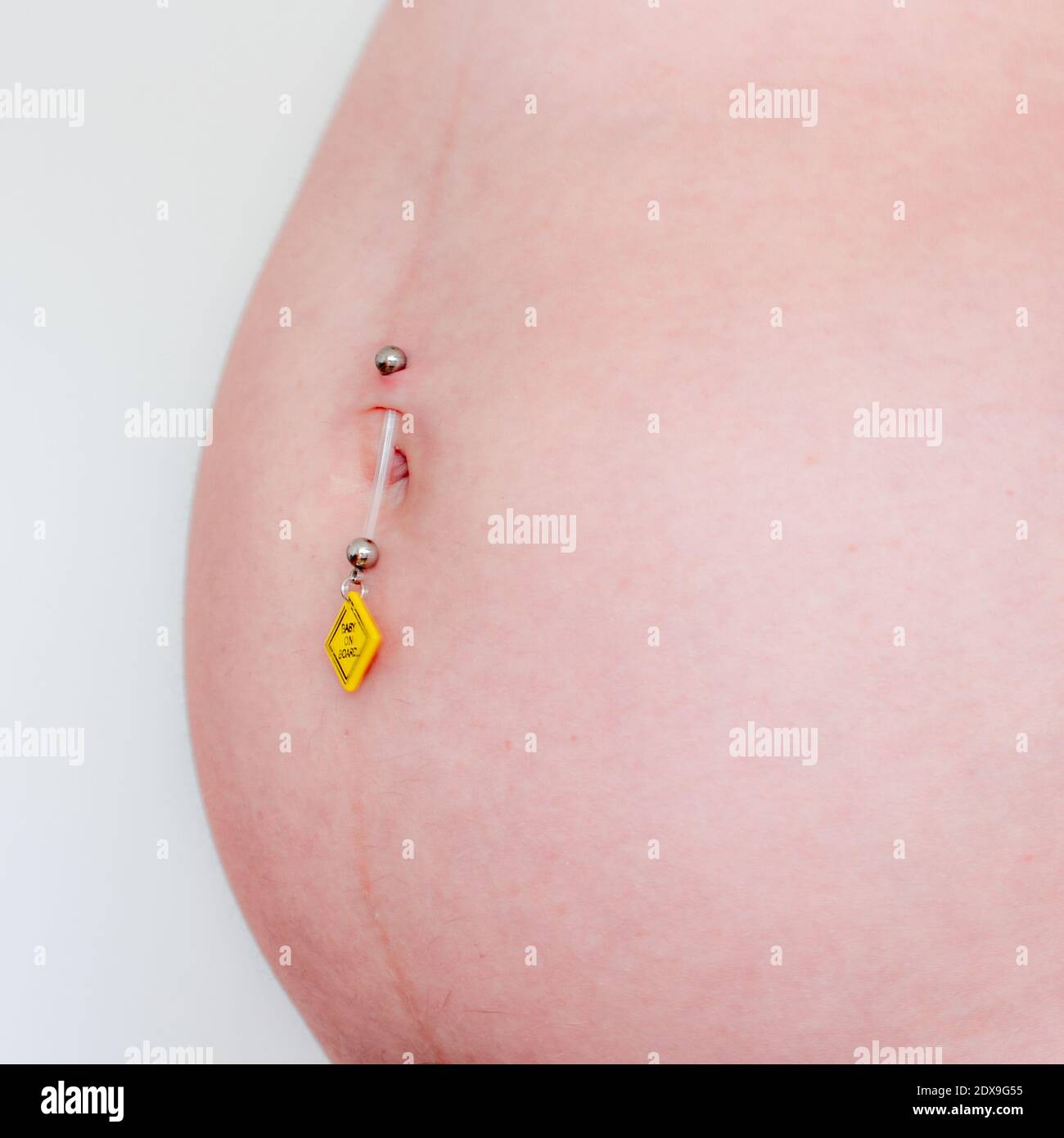 Belly piercing hi-res stock photography and images - Alamy