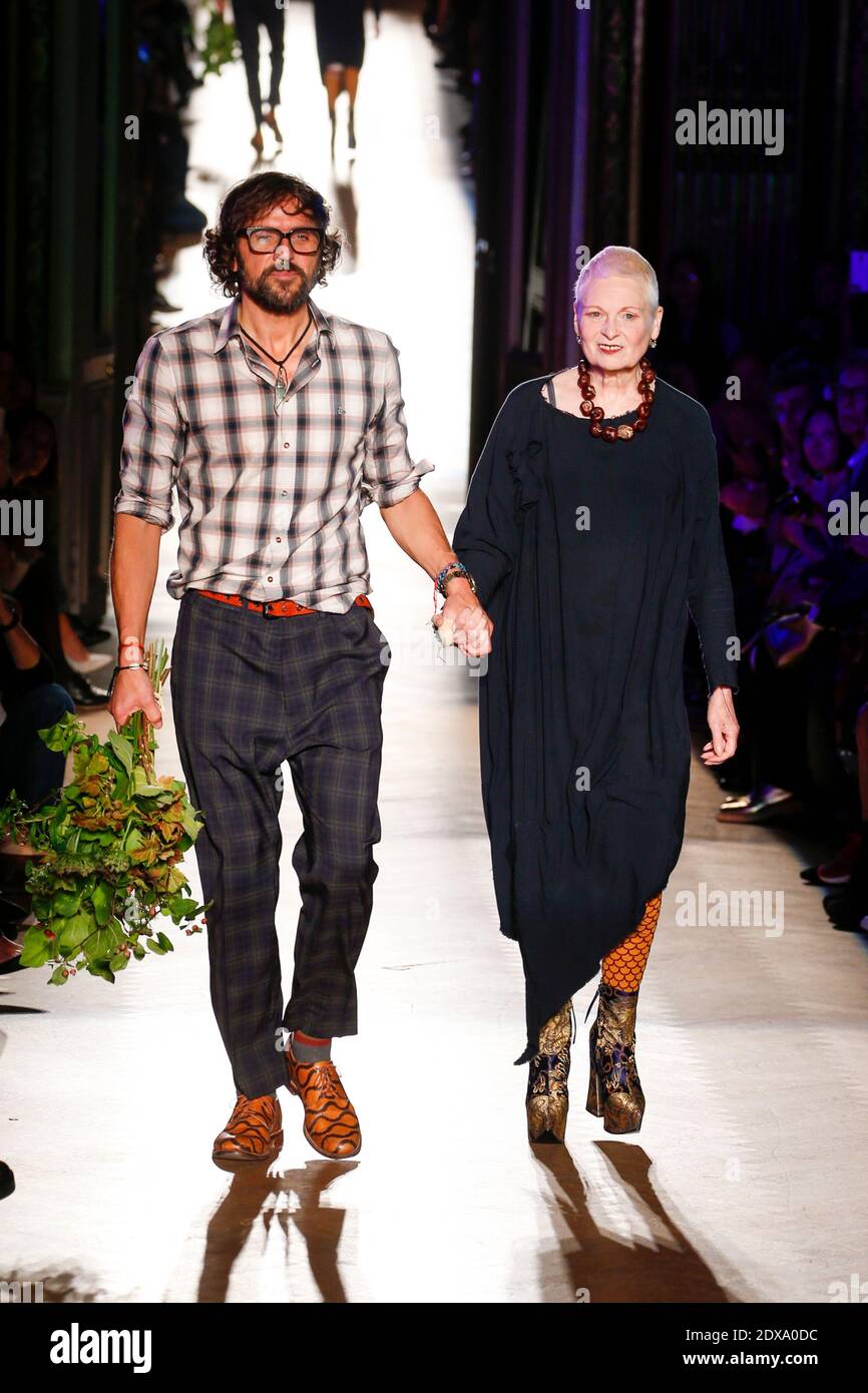Vivienne Westwood and her husband Andreas Kronthaler walk the runway ...