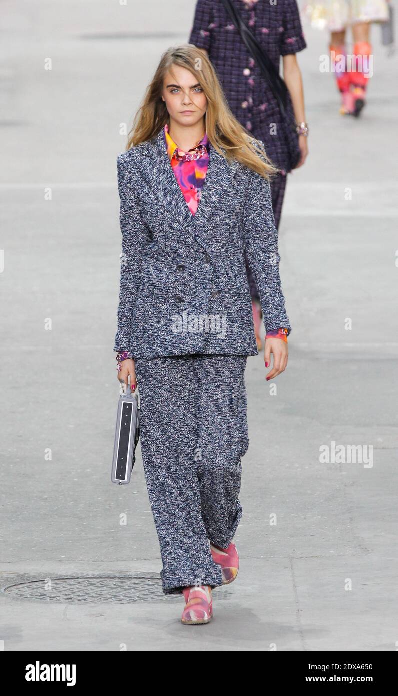 Model Cara Delevingne walks the runway during the Chanel show as