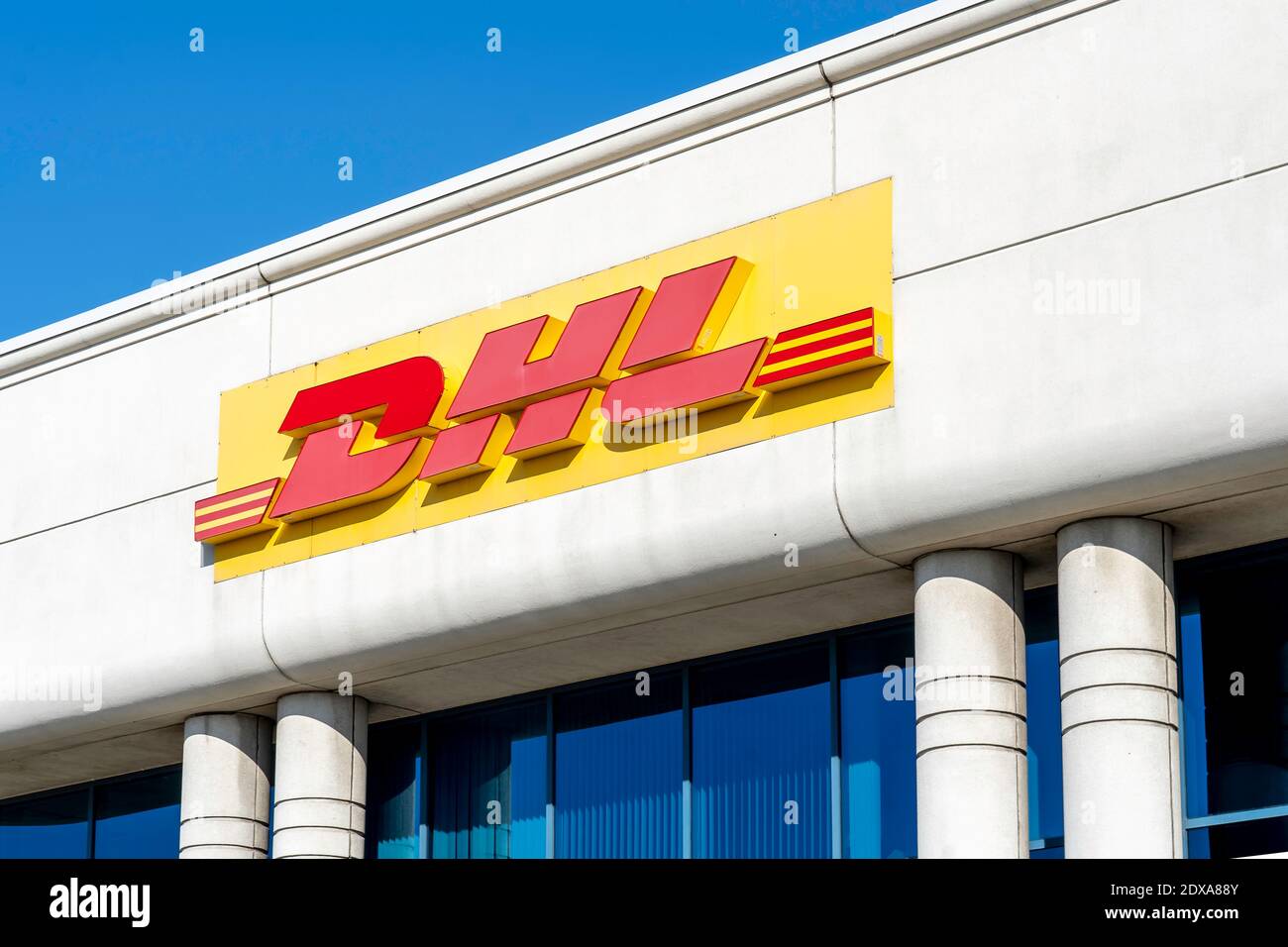 Mississauga, Ontario, Canada - October 23, 2019: Sign of DHL Global Forwarding on the building in Mississauga, Ontario, Canada. Stock Photo