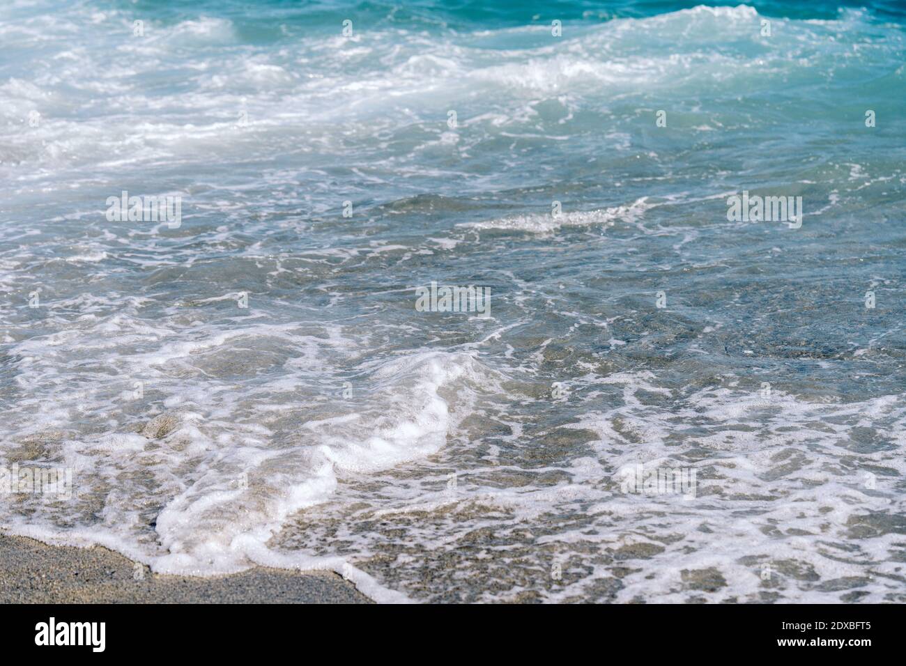 Beautiful foamy waves on beach hi-res stock photography and images - Alamy