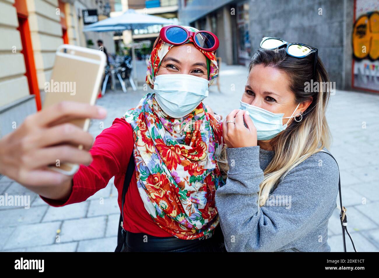 Women masks smartphone design hi-res stock photography and images - Alamy