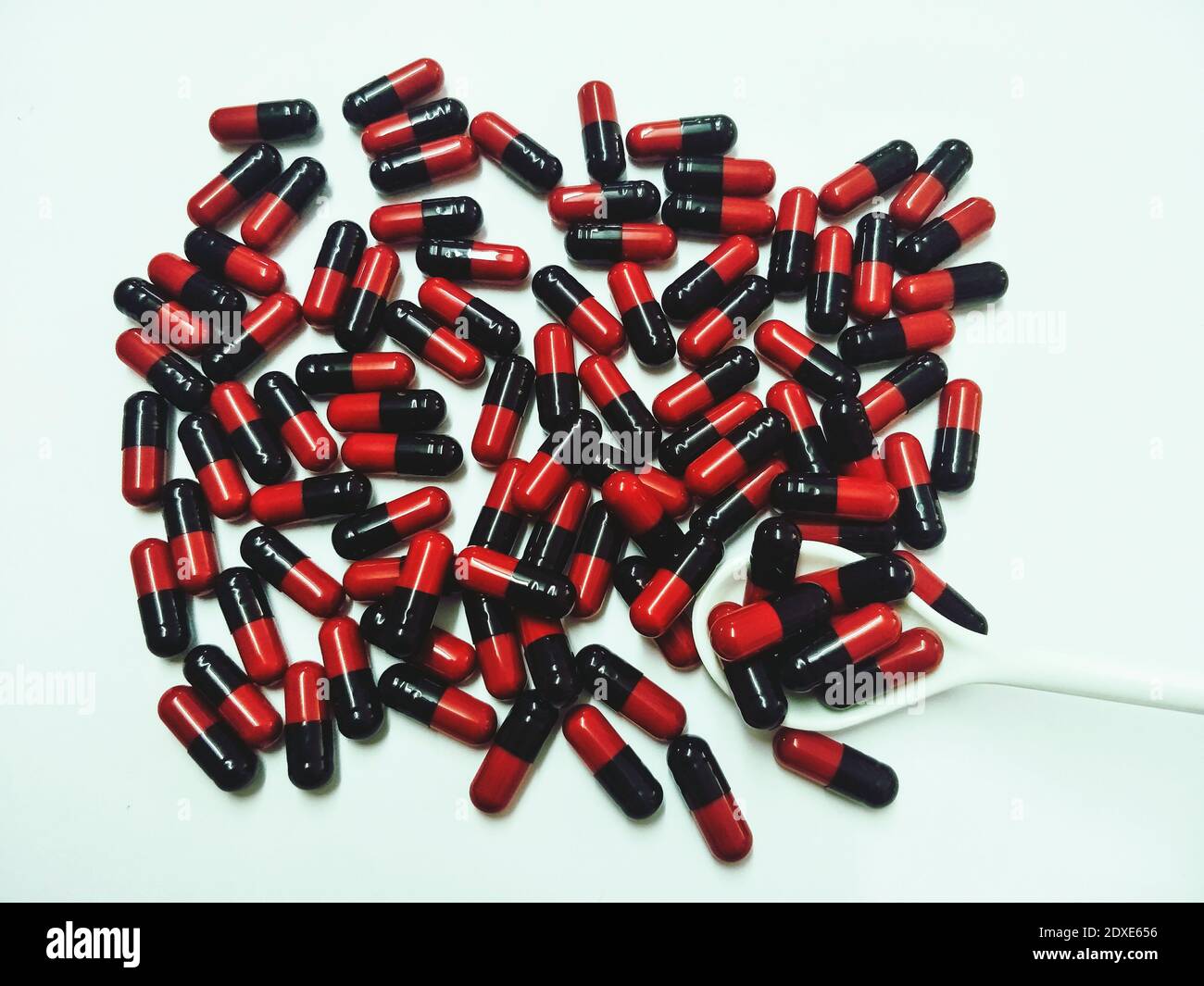 Black red drug pill vitamin hi-res stock photography and images - Alamy