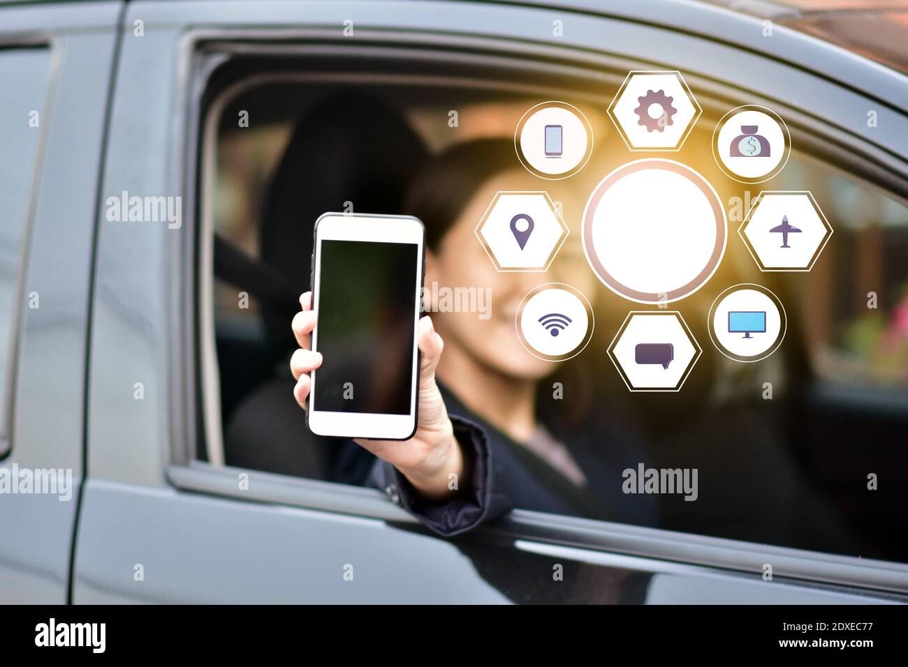 People sitting in car using mobile smart phone application social media ...