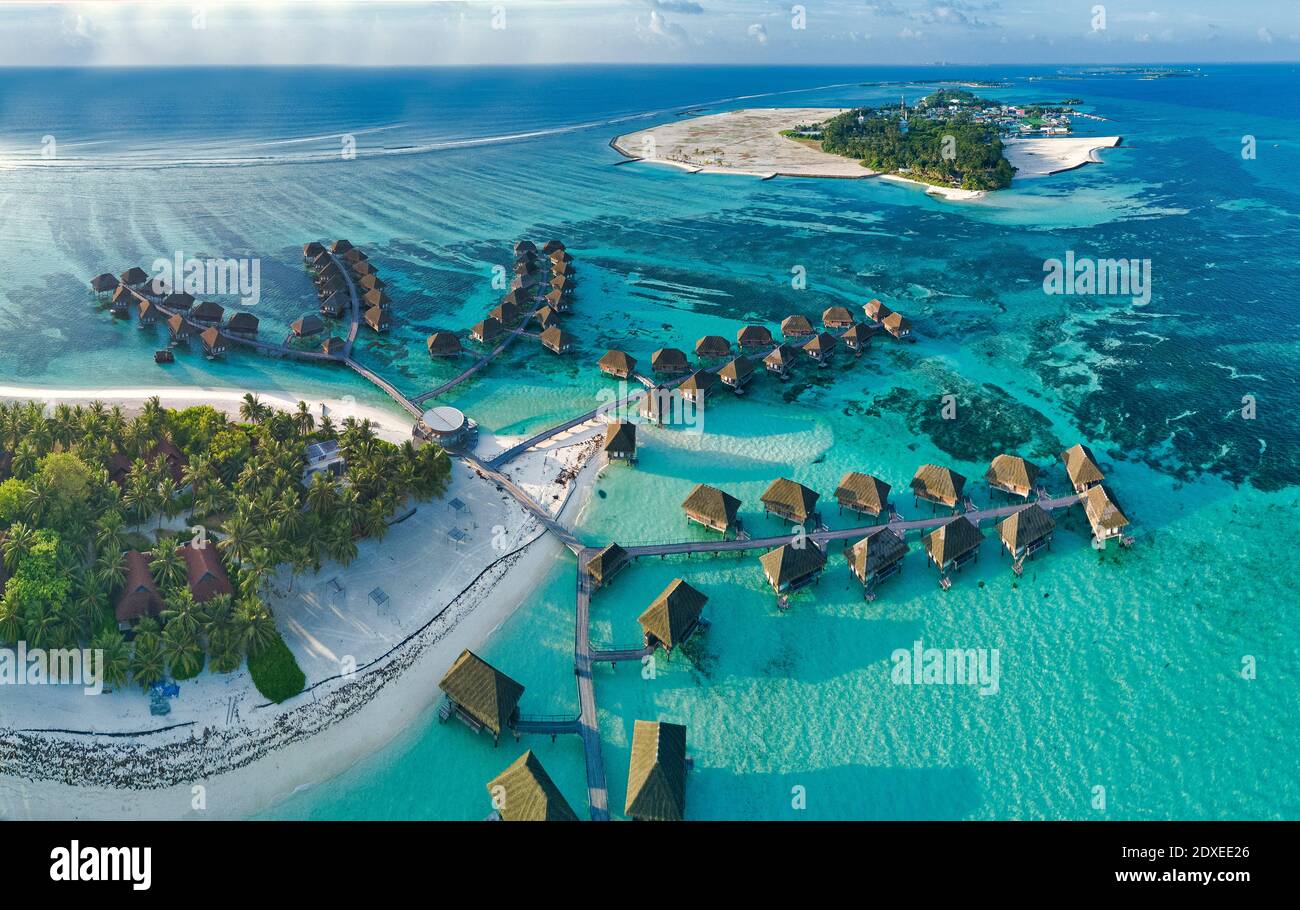 Maldives, Kaafu Atoll, Aerial view of tropical tourist resort on Huraa island Stock Photo