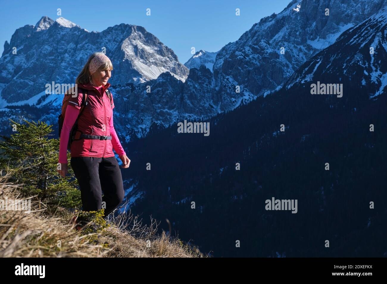 Senior woman in headband hi-res stock photography and images - Alamy