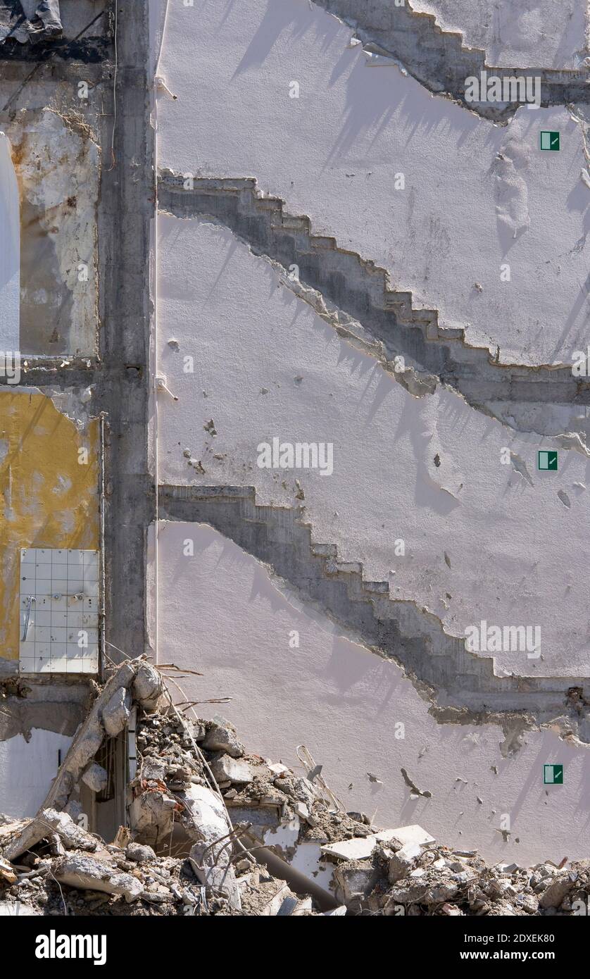 Rubble lying in front of demolished house wall Stock Photo - Alamy