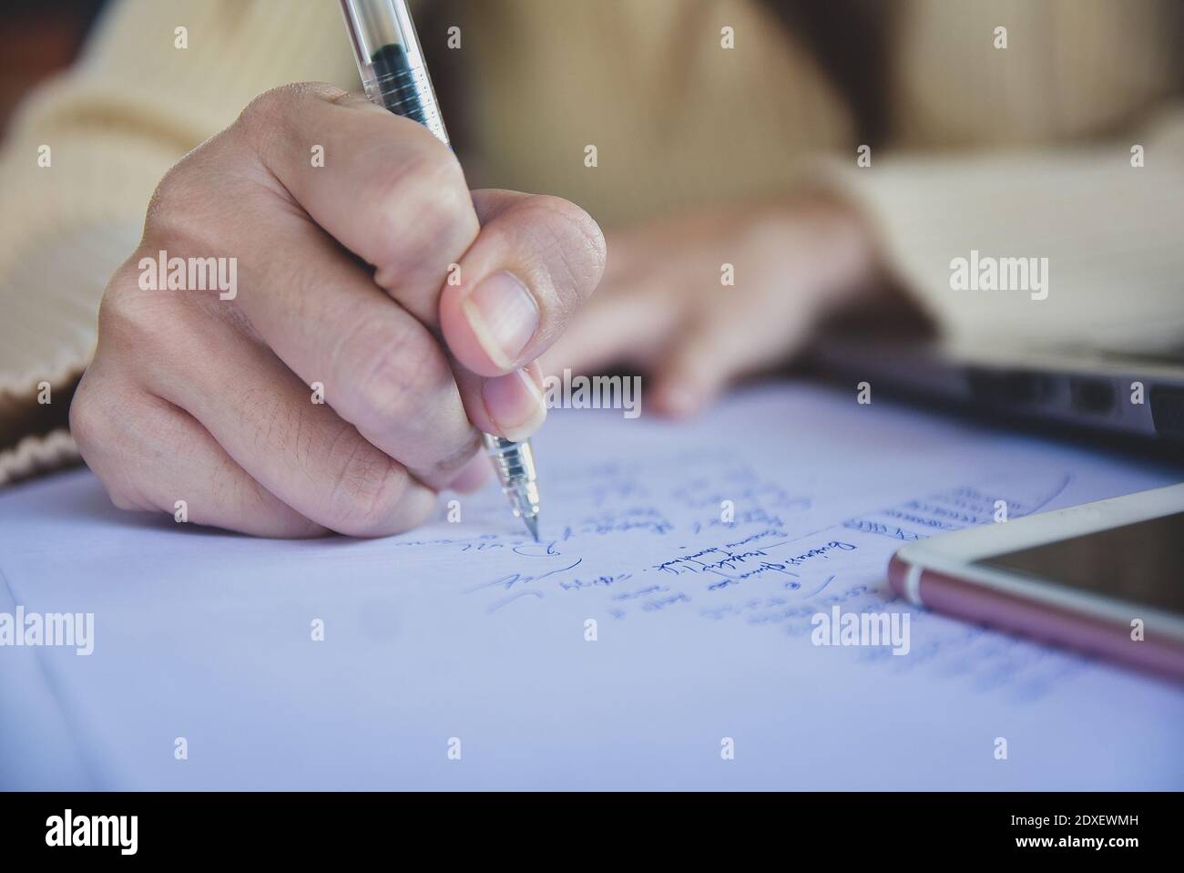 Close up hand sign document write on paper sign contract business work ...