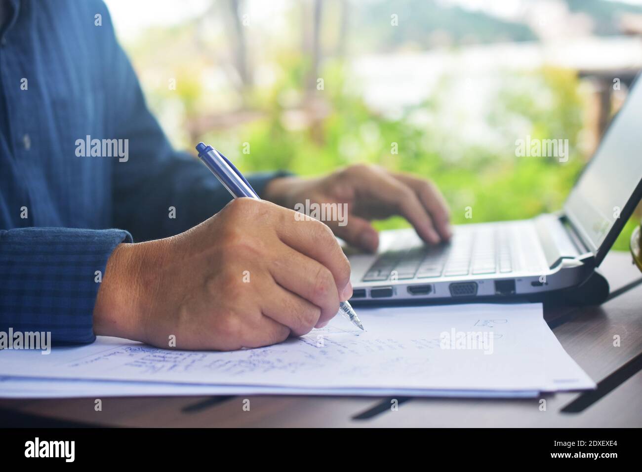 Close up hand sign document write on paper sign contract business work