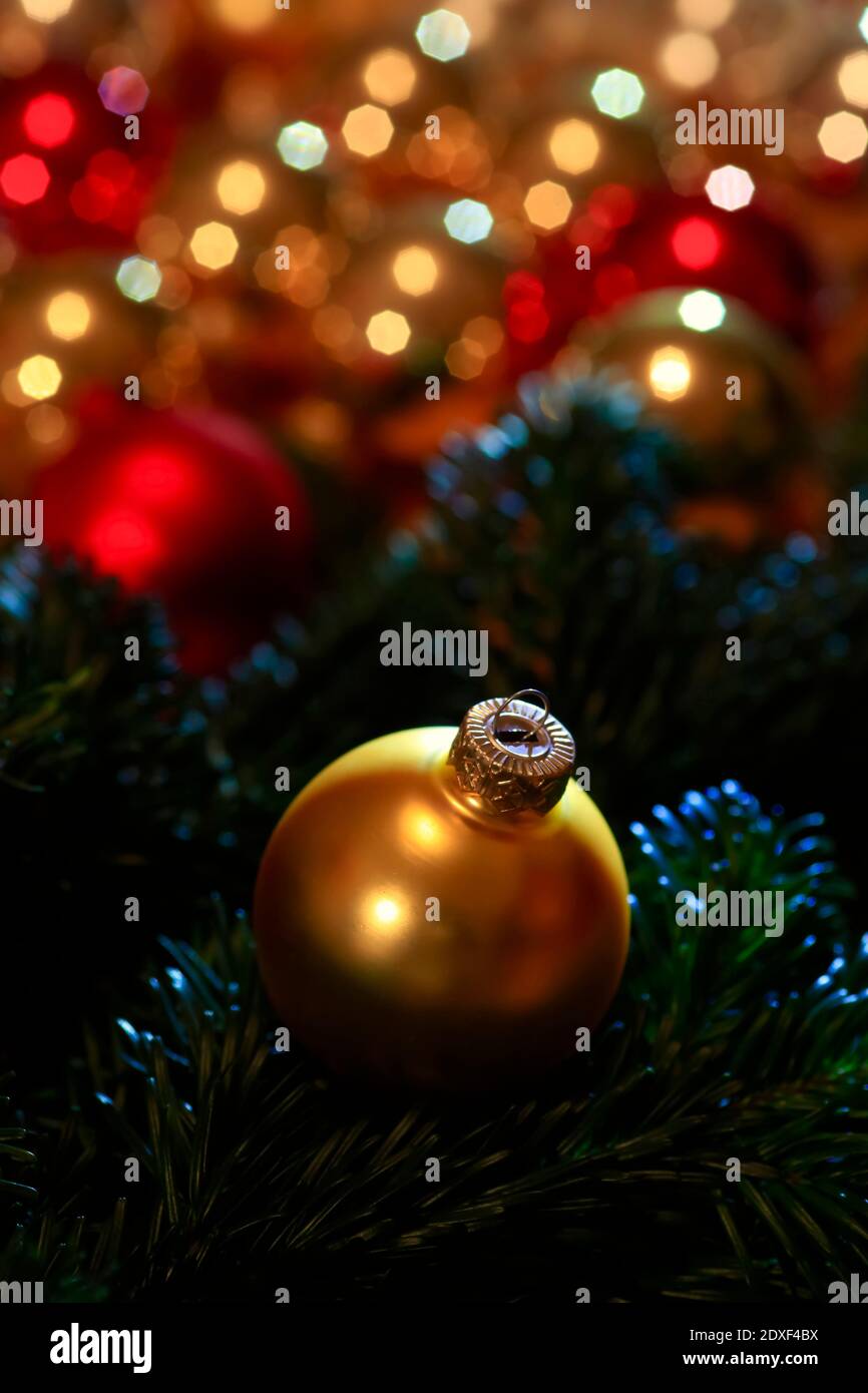 Gold colored Christmas bauble Stock Photo