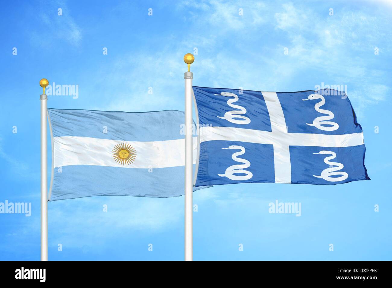 Argentina and Martinique snake two flags on flagpoles and blue sky