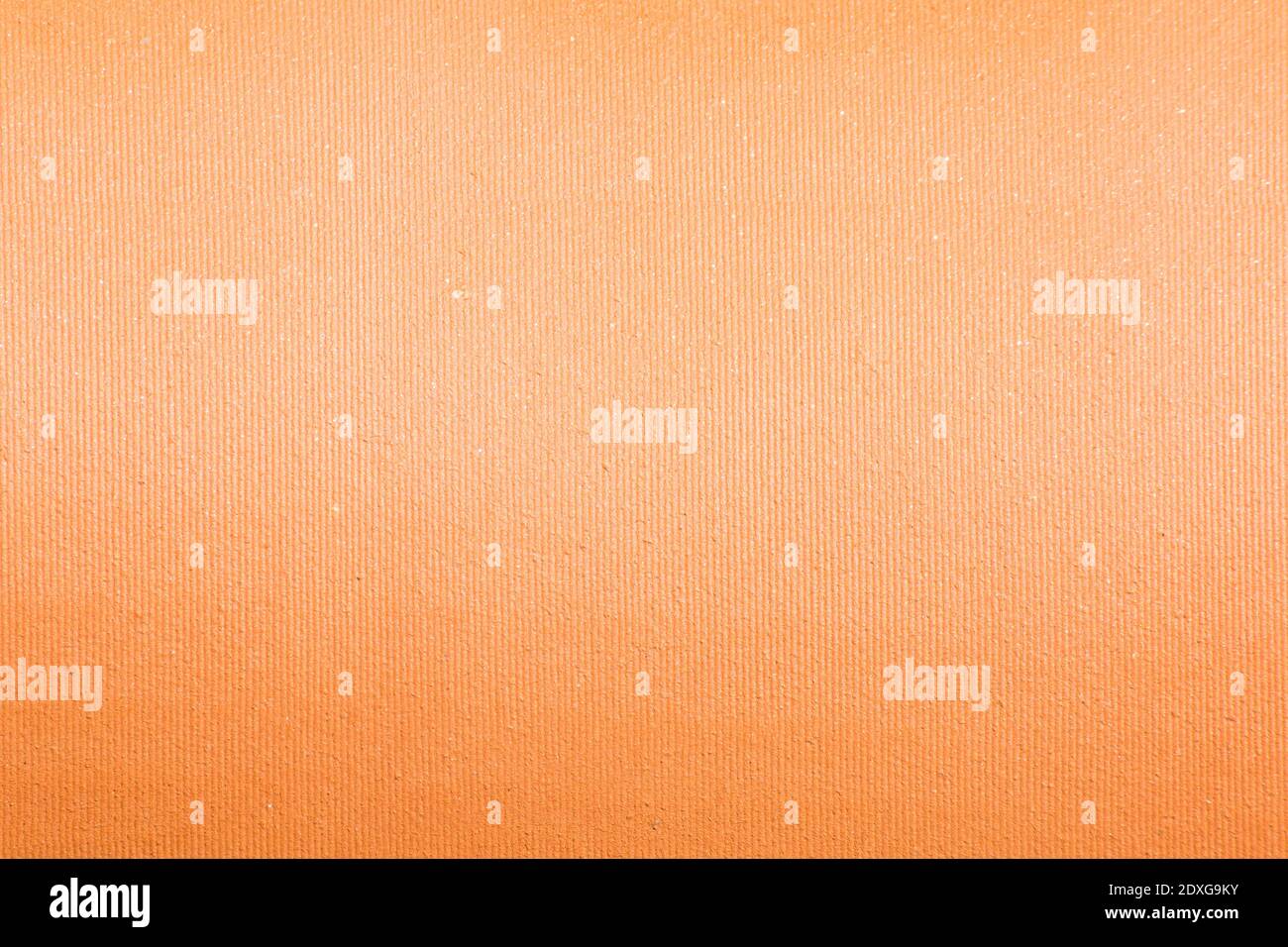 A texture of a tile in a shade of orange and yellow. foreground. ceramic. for background Stock Photo