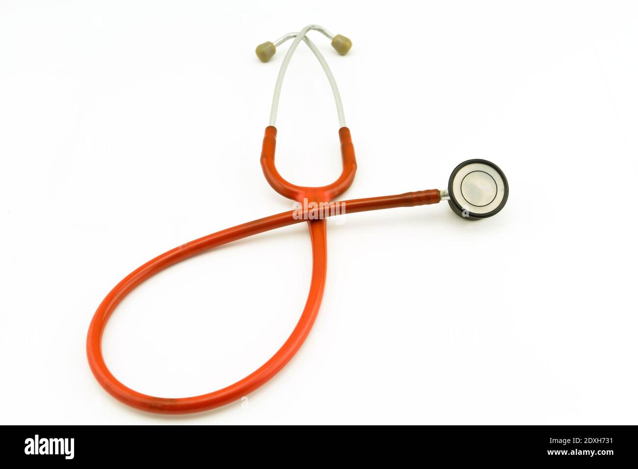 Orange Stethoscope Isolated On White Background Stock Photo