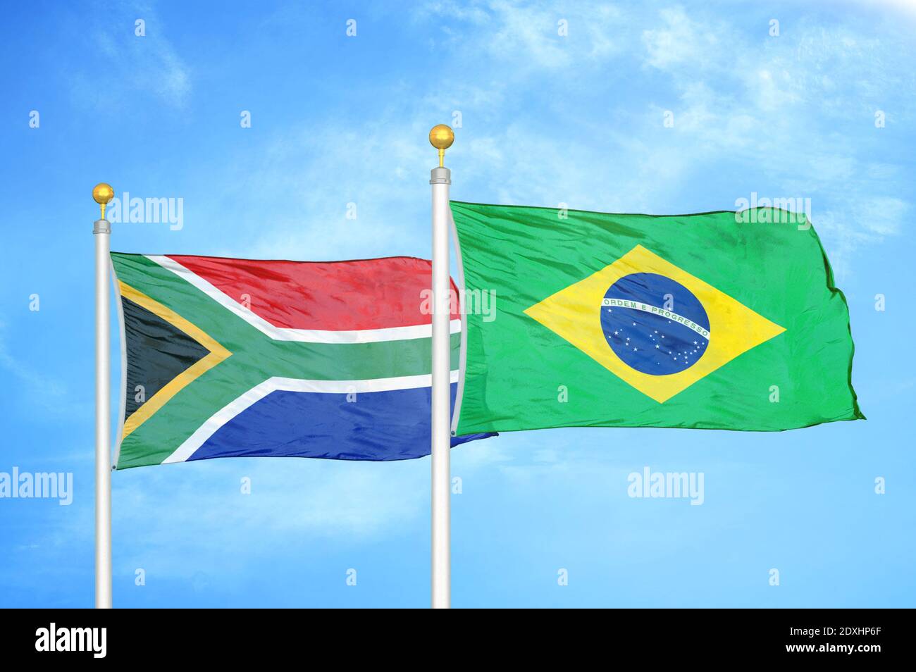 South Africa and Brazil two flags on flagpoles and blue sky Stock Photo ...
