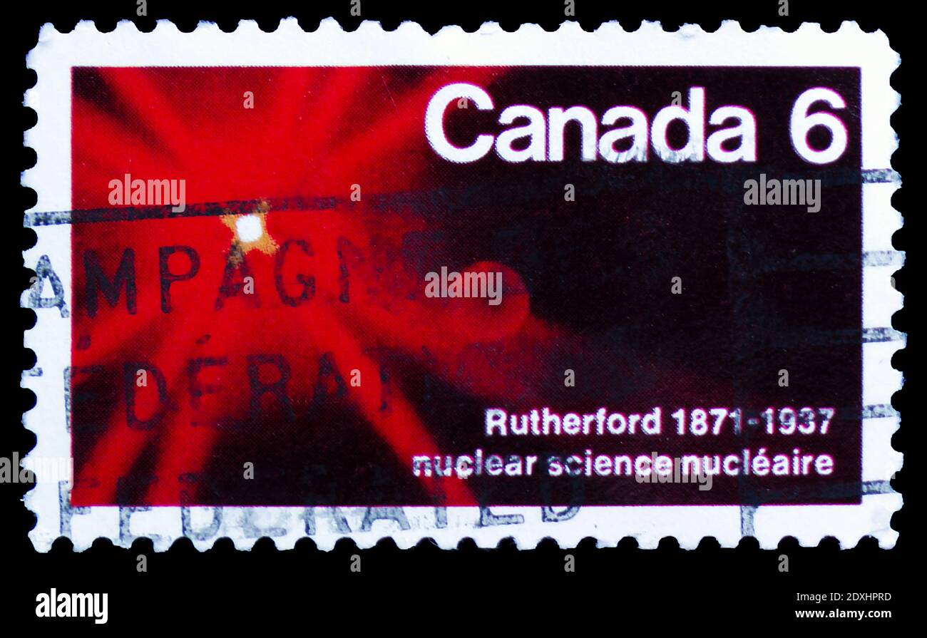 MOSCOW, RUSSIA - MARCH 23, 2019: Postage stamp printed in Canada shows 'The Atom' (Rutherford 1871-1937), Birth Centenary of Lord Rutherford (scientis Stock Photo