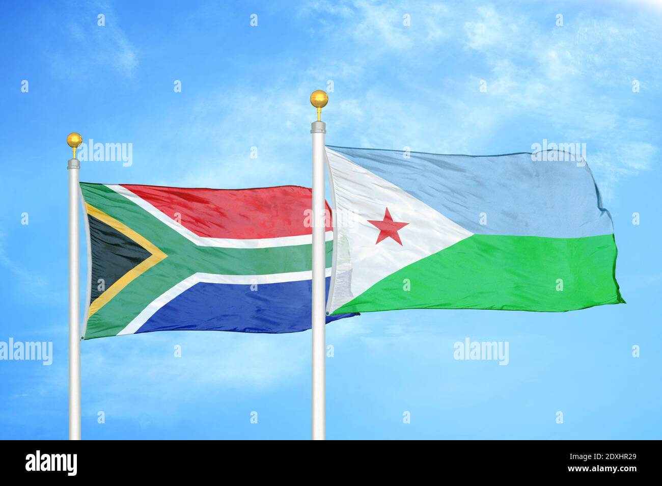 South Africa and Djibouti two flags on flagpoles and blue sky Stock Photo